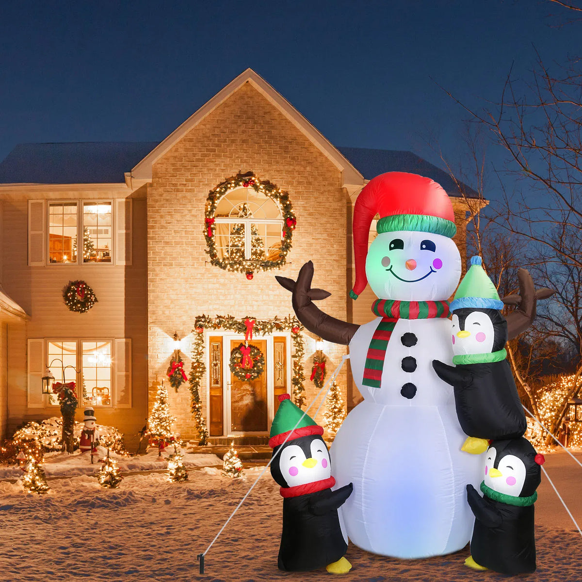 6 ft Inflatable Snowman and 3 Penguins with LED Lights